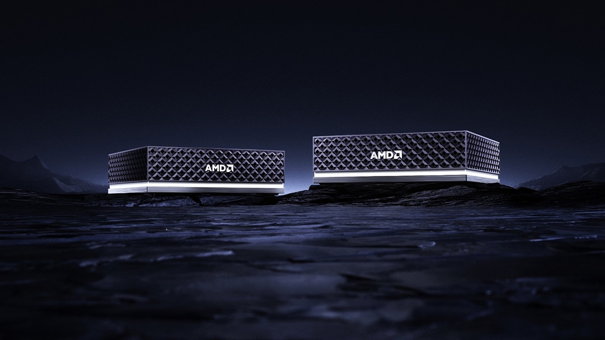 Two AMD Ryzen AI Halo compact desktop systems on a dark landscape