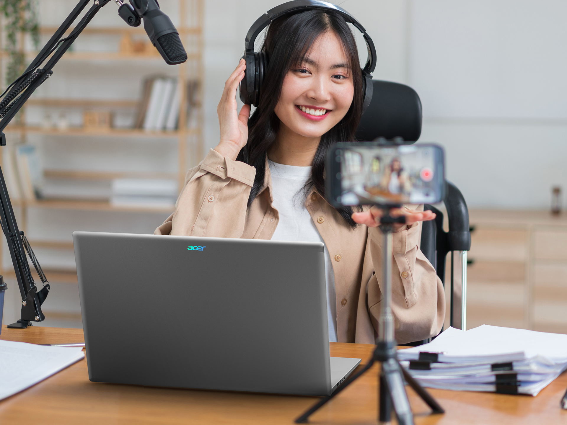 Acer Aspire 18 AI laptop on a home office desk during a content recording session