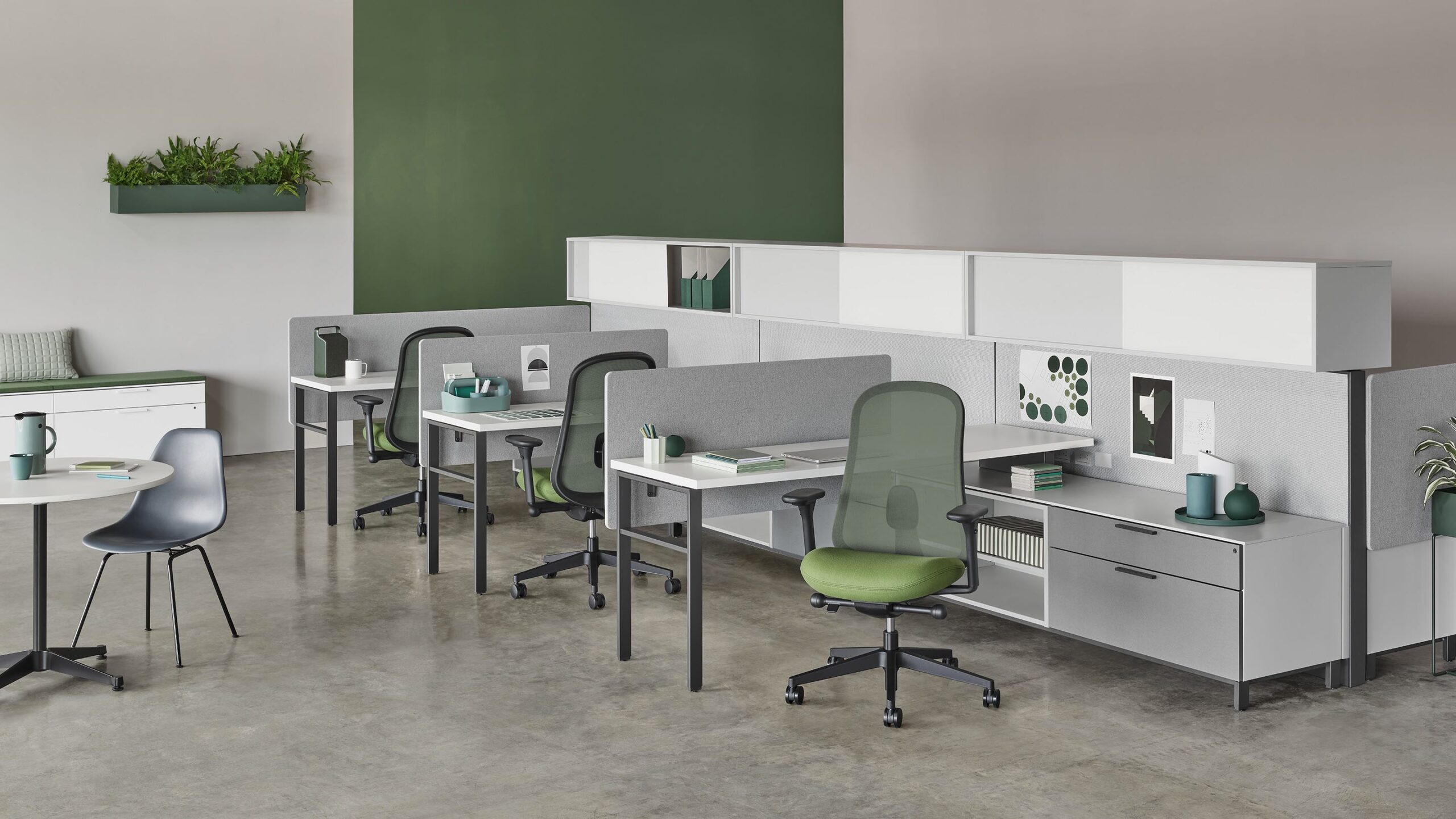 Office chairs at adjustable workstations before adding a seat cushion