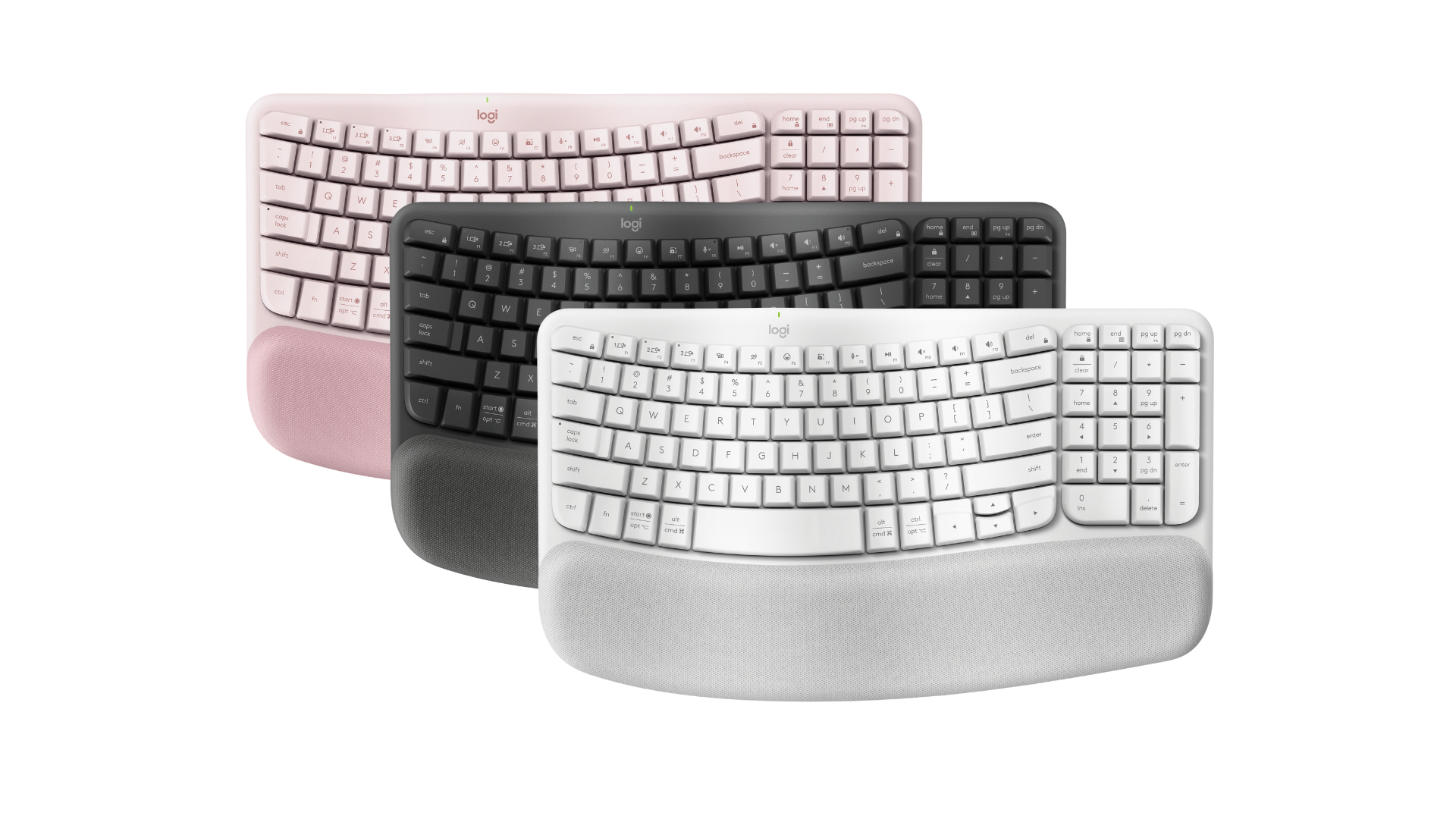 Three Logitech Wave Keys ergonomic keyboards with a curved layout and cushioned palm rests