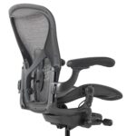 Office chair lumbar support adjustment on a Herman Miller Aeron chair
