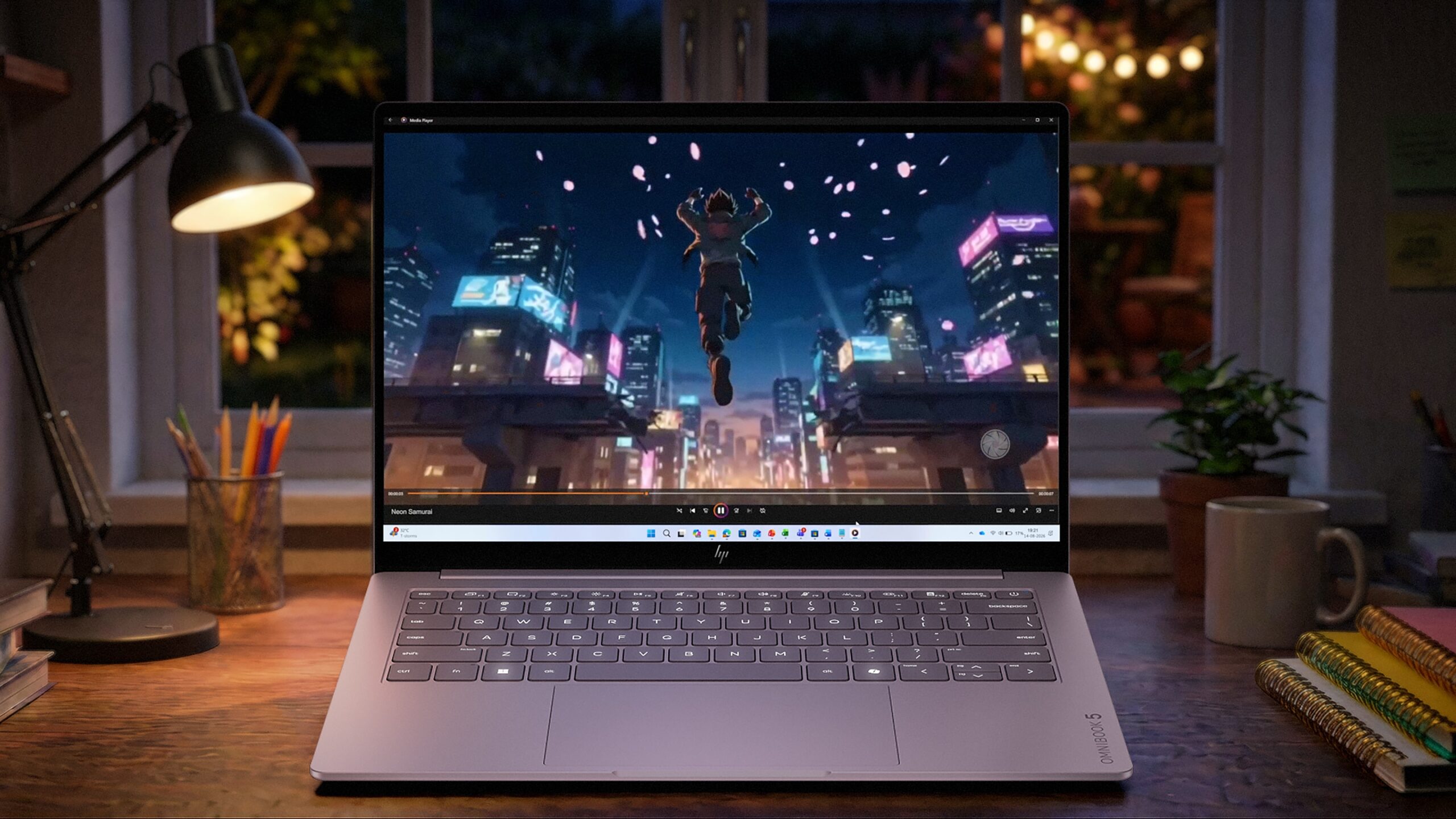 Laptop screen size shown on a 14-inch HP OmniBook 5 at a home desk